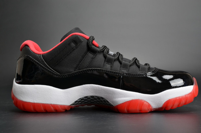 air jordan 11 retro low "bred" black/ red mens 528895-012